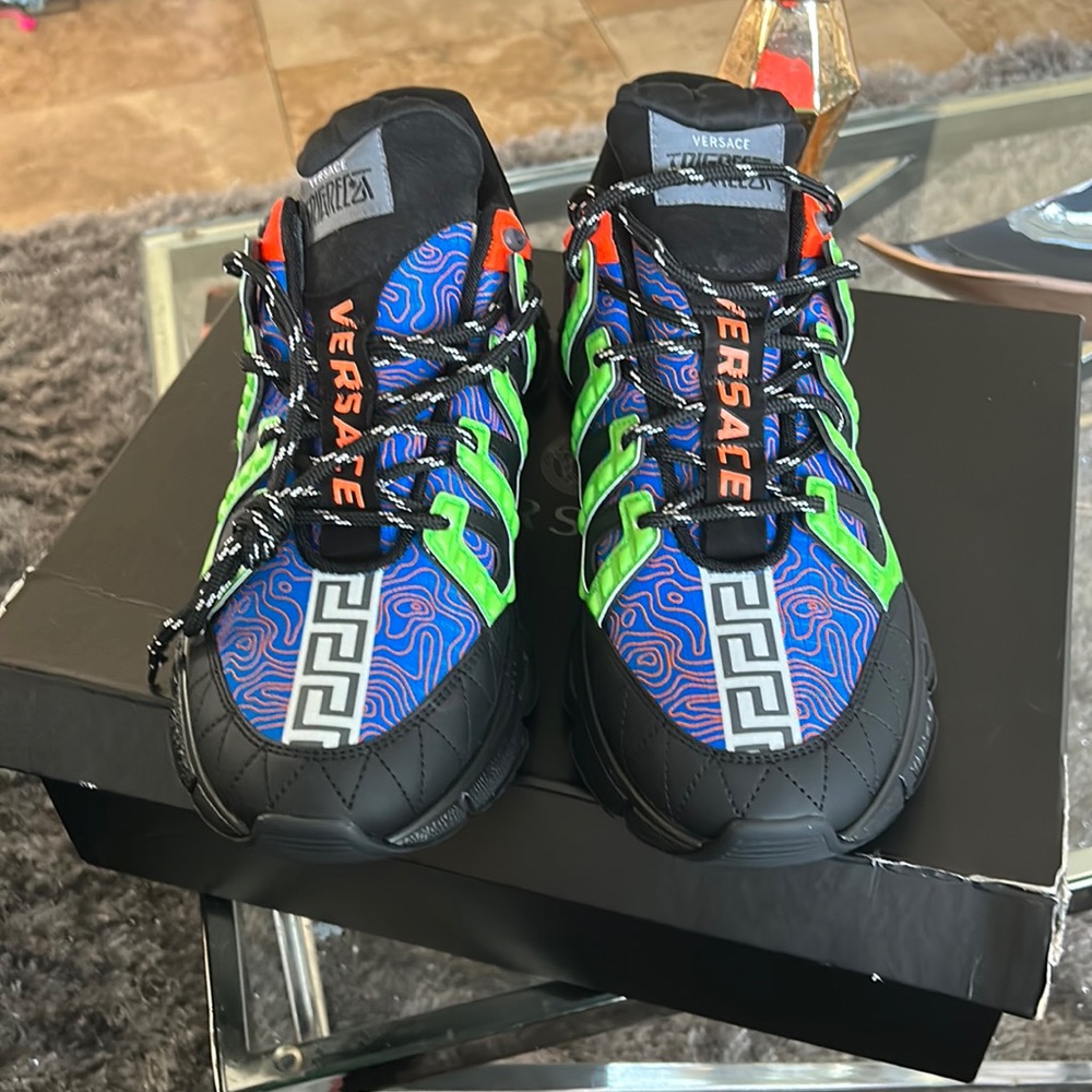 Size 101/2 brand new never worn,rare Versace shoes,got them to big